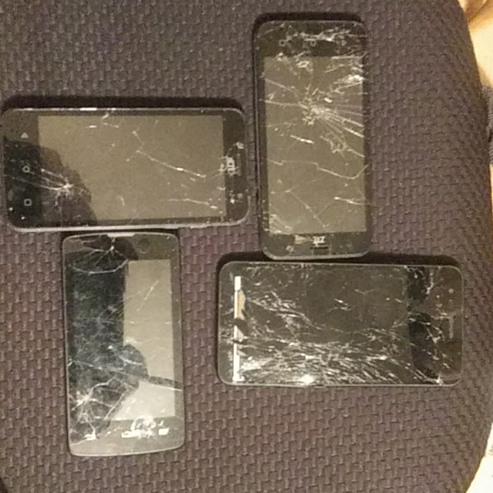 Broken cell phones for parts.